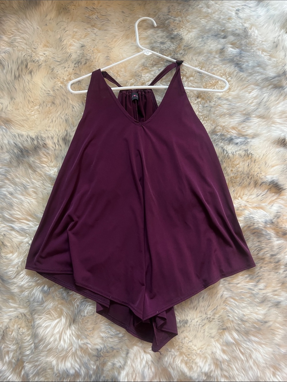 Like new  First Love Sleeveless V-Neck Top in Plum